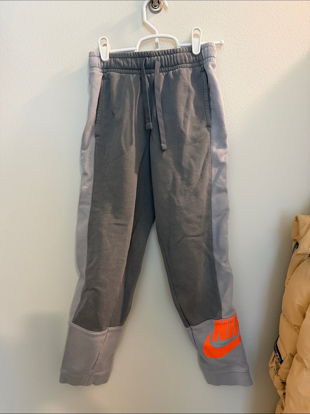 Nike Gray Jogger Sweatpants with Orange Logos and White Side Stripes